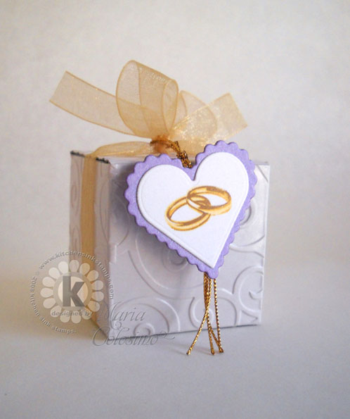 A quick and economical Embossed Wedding Favor The dry embossing gives this